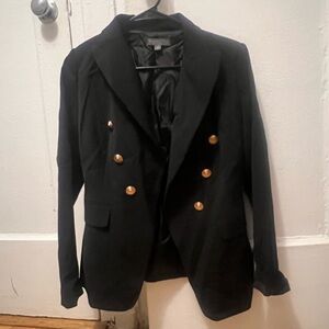 Black blazer with gold accent buttons